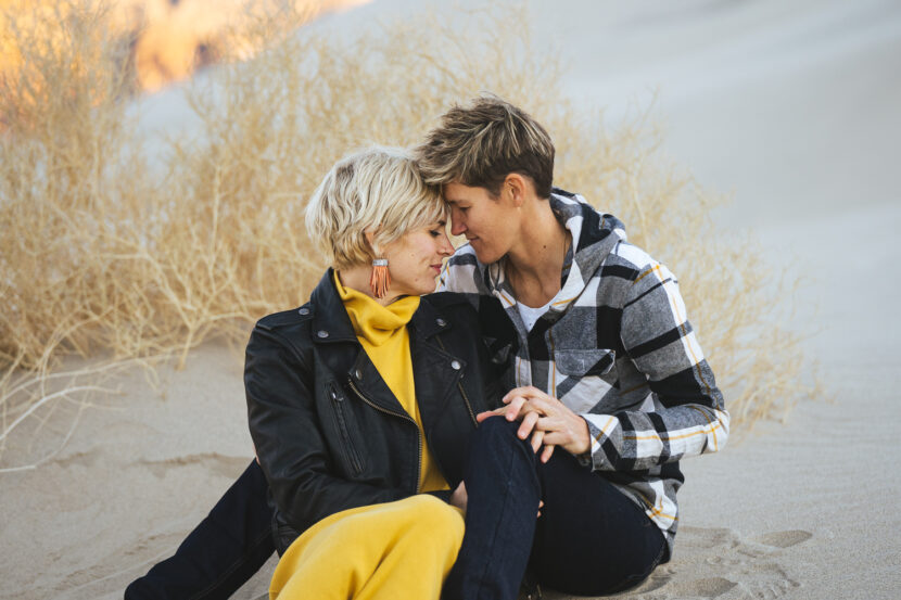 Two brides in the Death Valley Sand dunes, casual yellow dress