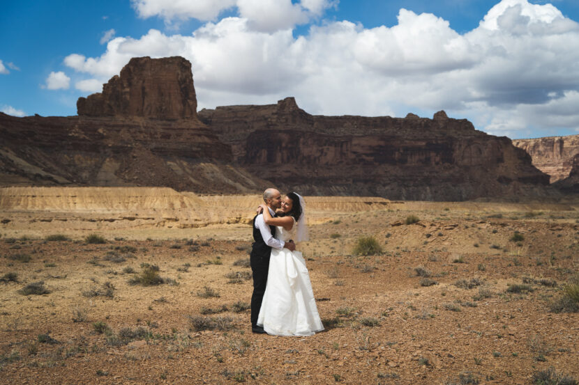 wedding couple explores the San Rafael Swell in Utah